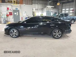 2017 Nissan Maxima SV with VIN 1N4AA6AP7HC405028, listed as a IAAI auction lot 41358504 with 92,231 mi miles. Bid and sale history available at carsss.com. Image 14.