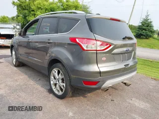 2013 Ford Escape Titanium with VIN 1FMCU9J96DUD74870, listed as a IAAI auction lot 42415332 with 178,651 mi miles and . Bid and sale history available at DreamBid. Image 3.