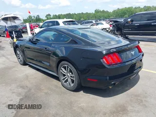2016 Ford Mustang EcoBoost z VIN 1FA6P8TH2G5276754, wystawiony jako IAAI lot #42157727 z przebiegiem 71 174 mil mil oraz . Historia ofert i sprzedaży dostępna na DreamBid. Obrazek 3.