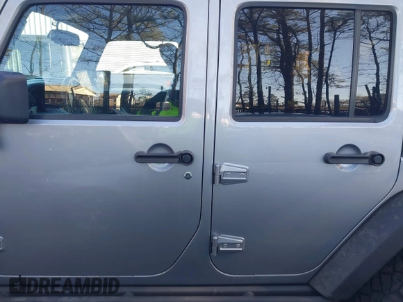 2015 Jeep Wrangler Unlimited Rubicon Hard Rock with VIN 1C4HJWFG1FL777222, listed as a IAAI auction lot 41843893 with 74,718 mi miles and . Bid and sale history available at DreamBid. Image 14.
