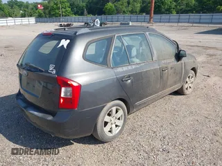 2007 Kia Rondo LX with VIN KNAFG525877075202, listed as a IAAI auction lot 42014611 with 206,496 mi miles. Bid and sale history available at carsss.com. Image 4.