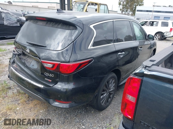2020 Infiniti QX60 Pure with VIN 5N1DL0MN5LC525763, listed as a IAAI auction lot 41259100 with 38,995 mi miles and . Bid and sale history available at DreamBid. Image 4.