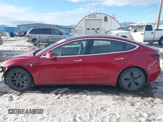 2018 Tesla Model 3 Long Range Battery with VIN 5YJ3E1EB0JF064041, listed as a IAAI auction lot 41562239 with 54,720 mi miles and . Bid and sale history available at DreamBid. Image 15.