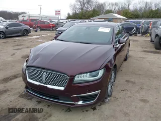 2017 Lincoln MKZ Select z VIN 3LN6L5CC3HR620854, wystawiony jako IAAI lot #41042376 z przebiegiem 131 517 mil mil oraz . Historia ofert i sprzedaży dostępna na DreamBid. Obrazek 17.