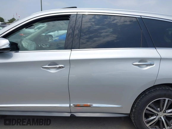 2019 Infiniti QX60 Pure with VIN 5N1DL0MN8KC548730, listed as a IAAI auction lot 42312037 with 53,163 mi miles and . Bid and sale history available at DreamBid. Image 14.