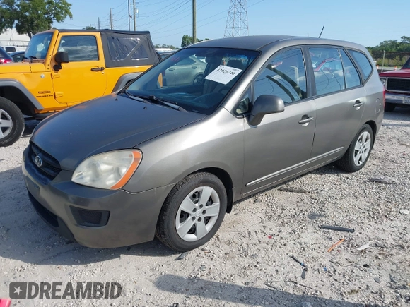 2009 Kia Rondo LX with VIN KNAFG528797267899, listed as a IAAI auction lot 42020740 with 141,113 mi miles. Bid and sale history available at carsss.com. Image 2.