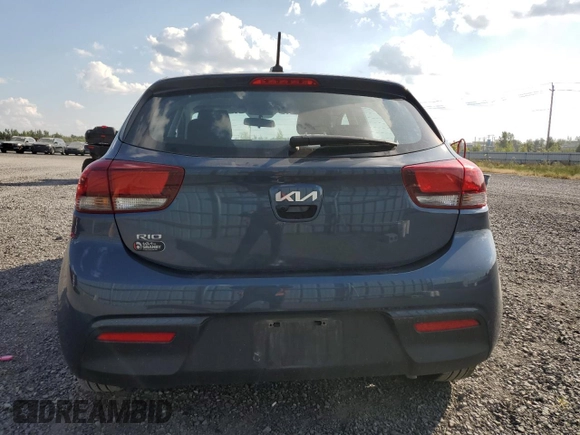 2023 Kia Rio S with VIN 3KPA25AD5PE548218, listed as a Copart auction lot 71808674 with 24,412 mi miles and Salvage Title. Bid and sale history available at DreamBid. Image 6.