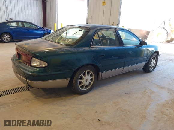 1998 Buick Regal GS with VIN 2G4WF5215W1484963, listed as a IAAI auction lot 42167192 with 277,396 mi miles. Bid and sale history available at carsss.com. Image 4.