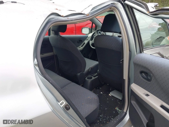 2010 Toyota Yaris with VIN JTDKT4K38A5296999, listed as a IAAI auction lot 41878127 with 122,692 mi miles. Bid and sale history available at carsss.com. Image 8.