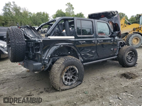2023 Jeep Wrangler Rubicon with VIN 1C4HJXFN9PW507594, listed as a Copart auction lot 73111214 with Not provided miles and Salvage title. Bid and sale history available at DreamBid. Image 3.