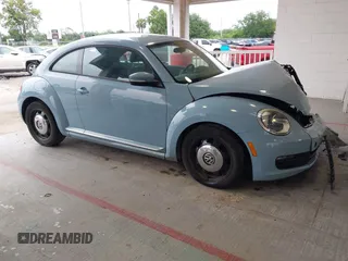 2014 Volkswagen Beetle 2.5L with VIN 3VWJX7AT5EM621477, listed as a IAAI auction lot 42241444 with 151,002 mi miles and . Bid and sale history available at DreamBid. Image 1.