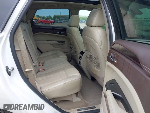 2012 Cadillac SRX Performance Collection with VIN 3GYFNEE34CS579352, listed as a IAAI auction lot 42627607 with 168,752 mi miles and . Bid and sale history available at DreamBid. Image 8.