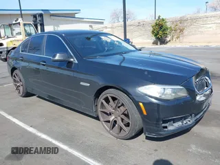 2014 BMW 5 Series 528i with VIN WBA5A5C58ED500475, listed as a IAAI auction lot 41611407 with 126,601 mi miles. Bid and sale history available at carsss.com. Image 1.
