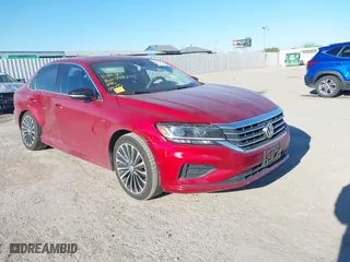 2022 Volkswagen Passat 2.0T Limited Edition with VIN 1VWBA7A3XNC009380, listed as a IAAI auction lot 40993689 with 63,435 mi miles. Bid and sale history available at carsss.com. Image 1.