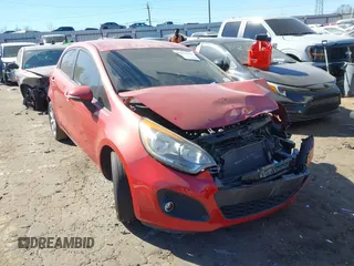 2013 Kia Rio SX with VIN KNADN5A36D6103285, listed as a IAAI auction lot 41635510 with 124,486 mi miles and . Bid and sale history available at DreamBid. Image 1.