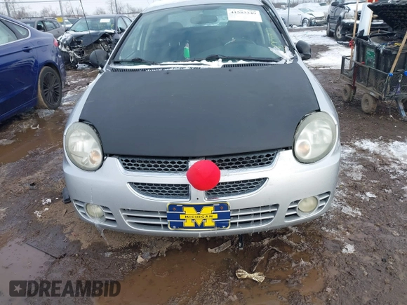 2003 Dodge Neon SXT with VIN 1B3ES56C93D168622, listed as a IAAI auction lot 41583349 with 153,009 mi miles. Bid and sale history available at carsss.com. Image 12.