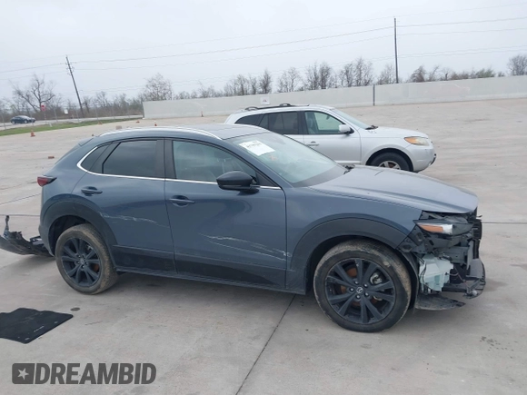 2023 Mazda CX-30 S Carbon Edition with VIN 3MVDMBCM0PM532449, listed as a IAAI auction lot 41799255 with 60,604 mi miles and . Bid and sale history available at DreamBid. Image 14.
