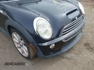 2006 MINI Convertible S с VIN WMWRH33536TL93425, выставлен на аукционе IAAI как лот 41950272 с пробегом Не указан миль и . История ставок и продаж доступна на DreamBid. Изображение 6.