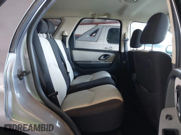2007 Mercury Mariner Convenience with VIN 4M2YU80ZX7KJ02239, listed as a IAAI auction lot 41623532 with 231,629 mi miles and . Bid and sale history available at DreamBid. Image 8.