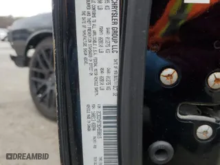2013 Dodge Challenger R/T with VIN 2C3CDYBT9DH558815, listed as a Copart auction lot 47601315 with 124,098 mi miles and Salvage Title. Bid and sale history available at carsss.com. Image 12.