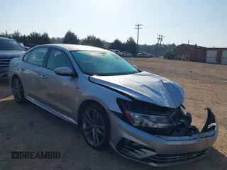 2018 Volkswagen Passat 2.0T S with VIN 1VWAA7A32JC035560, listed as a IAAI auction lot 41803286 with 125,969 mi miles. Bid and sale history available at carsss.com. Image 1.