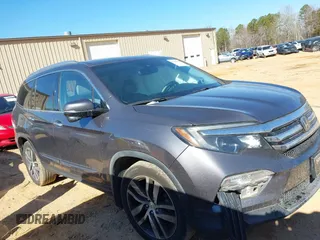 2017 Honda Pilot Touring with VIN 5FNYF5H92HB038893, listed as a IAAI auction lot 41639555 with 100,354 mi miles. Bid and sale history available at carsss.com. Image 13.