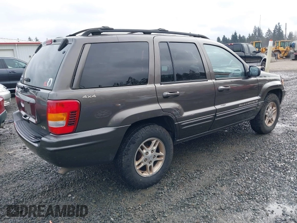 1999 Jeep Grand Cherokee Limited with VIN 1J4GW68N7XC739479, listed as a IAAI auction lot 41448323 with 129,840 mi miles. Bid and sale history available at carsss.com. Image 4.