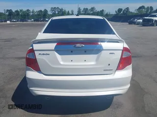 2012 Ford Fusion SEL z VIN 3FAHP0JG1CR167326, wystawiony jako IAAI lot #42320109 z przebiegiem 117 381 mil mil oraz . Historia ofert i sprzedaży dostępna na DreamBid. Obrazek 16.