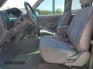 2001 Toyota Tacoma with VIN 5TEWM72NX1Z842202, listed as a Copart auction lot 53111405 with 304,857 mi miles and Salvage title. Bid and sale history available at DreamBid. Image 7.