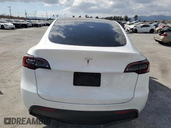 2022 Tesla Model Y Long Range z VIN 7SAYGDEE9NF434908, wystawiony jako Copart lot #56733235 z przebiegiem 38 178 mil mil oraz Szkoda całkowita • Salvage title. Historia ofert i sprzedaży dostępna na DreamBid. Obrazek 6.