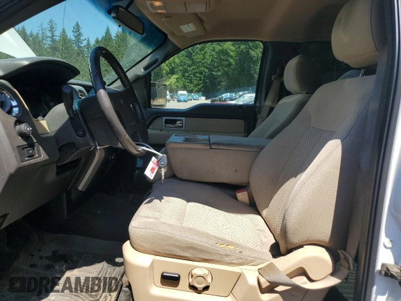 2011 Ford F-150 XLT with VIN 1FTFW1ET1BFB45761, listed as a Copart auction lot 64660595 with 240,317 mi miles and Salvage title. Bid and sale history available at DreamBid. Image 7.
