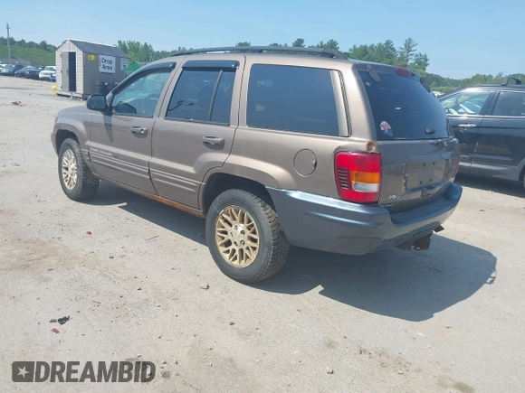 2002 Jeep Grand Cherokee Limited z VIN 1J8GW58N62C213751, wystawiony jako IAAI lot #42478869 z przebiegiem 233 848 mil mil oraz . Historia ofert i sprzedaży dostępna na DreamBid. Obrazek 3.