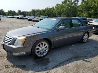 2007 Cadillac DTS V8 z VIN 1G6KD57Y67U136984, wystawiony jako Copart lot #65570084 z przebiegiem 114 814 mil mil oraz Szkoda całkowita • Salvage title. Historia ofert i sprzedaży dostępna na DreamBid. Obrazek 1.