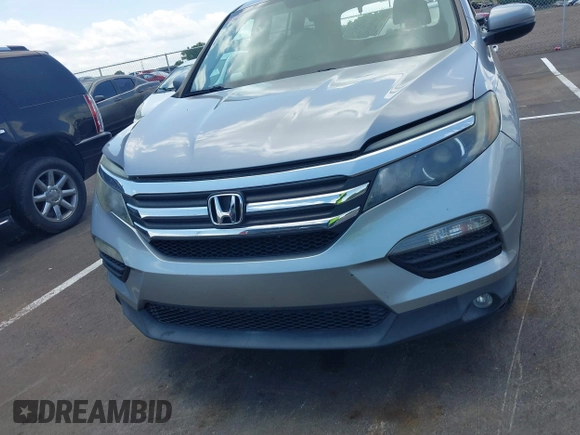 2018 Honda Pilot EX-L with VIN 5FNYF5H56JB003955, listed as a IAAI auction lot 42732433 with 116,613 mi miles and . Bid and sale history available at DreamBid. Image 12.