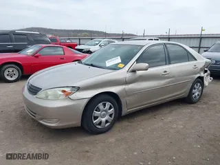 2004 Toyota Camry LE with VIN 4T1BE32KX4U909903, listed as a IAAI auction lot 41824226 with 173,518 mi miles. Bid and sale history available at carsss.com. Image 18.
