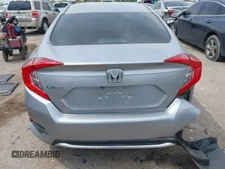2019 Honda Civic LX with VIN 19XFC2F66KE026931, listed as a IAAI auction lot 41885137 with 55,057 mi miles and . Bid and sale history available at DreamBid. Image 16.