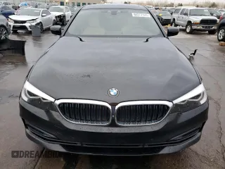 2018 BMW 5 Series 530e xDrive with VIN WBAJB1C5XJB084018, listed as a Copart auction lot 86277124 with 127,517 mi miles and Salvage Title. Bid and sale history available at carsss.com. Image 5.