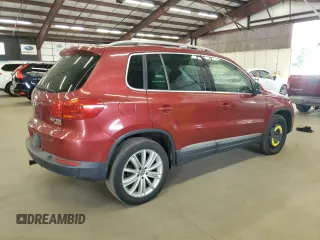 2014 Volkswagen Tiguan SEL с VIN WVGBV3AX8EW026076, выставлен на аукционе Copart как лот 65003585 с пробегом 104 473 миль миль и Чистый • Clean title. История ставок и продаж доступна на DreamBid. Изображение 3.