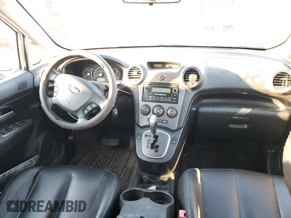2009 Kia Rondo LX Base with VIN KNAFG528597268730, listed as a Copart auction lot 77071064 with 151,159 mi miles and Salvage Title. Bid and sale history available at carsss.com. Image 8.