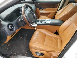 2014 Jaguar XJ with VIN SAJWJ2GD3E8V64988, listed as a Copart auction lot 55375034 with 0 mi miles and Clean Title. Bid and sale history available at carsss.com. Image 7.