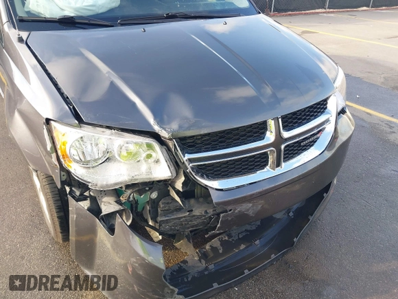 2017 Dodge Grand Caravan SE with VIN 2C4RDGBG3HR865948, listed as a IAAI auction lot 41916859 with 137,448 mi miles and . Bid and sale history available at DreamBid. Image 6.