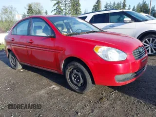 2011 Hyundai Accent GLS with VIN KMHCN4AC7BU618986, listed as a IAAI auction lot 42003238 with 124,239 mi miles. Bid and sale history available at carsss.com. Image 1.