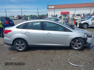 2017 Ford Focus SE with VIN 1FADP3FE4HL295573, listed as a IAAI auction lot 39562568 with 96,939 mi miles and . Bid and sale history available at carsss.com. Image 13.