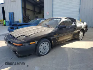 1989 Toyota Supra z VIN JT2MA71J3K0127383, wystawiony jako Copart lot #67868181 z przebiegiem 137 683 mil mil oraz Czysty tytuł • Clean title. Historia ofert i sprzedaży dostępna na DreamBid. Obrazek 2.