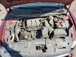 2014 Ford Taurus Limited z VIN 1FAHP2F82EG141034, wystawiony jako Copart lot #52579995 z przebiegiem 207 709 mil mil oraz Szkoda całkowita • Salvage title. Historia ofert i sprzedaży dostępna na DreamBid. Obrazek 13.