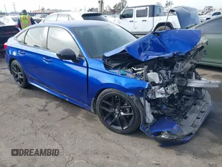2022 Honda Civic Sport z VIN 2HGFE2F56NH583530, wystawiony jako IAAI lot #41398683 z przebiegiem Nie podano mil oraz . Historia ofert i sprzedaży dostępna na DreamBid. Obrazek 1.