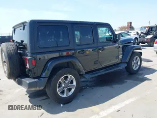2020 Jeep Wrangler Unlimited Sahara with VIN 1C4HJXEN6LW235159, listed as a IAAI auction lot 42045083 with 68,400 mi miles and . Bid and sale history available at DreamBid. Image 4.