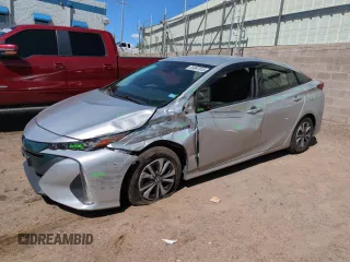 2017 Toyota Prius Plus z VIN JTDKARFP2H3008738, wystawiony jako Copart lot #56997615 z przebiegiem 99 281 mil mil oraz Szkoda całkowita • Salvage title. Historia ofert i sprzedaży dostępna na DreamBid. Obrazek 1.