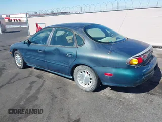 1996 Ford Taurus LX with VIN 1FALP53S0TG125665, listed as a IAAI auction lot 42290691 with 91,152 mi miles and . Bid and sale history available at DreamBid. Image 3.