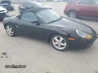 1998 Porsche Boxster с VIN WP0CA2982WU620882, выставлен на аукционе Copart как лот 50950515 с пробегом Не указан миль и Списание • Salvage title. История ставок и продаж доступна на DreamBid. Изображение 4.